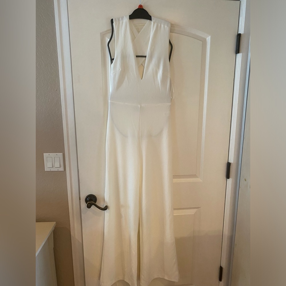 NWT White deep v Lulus jumpsuit with crisscross back